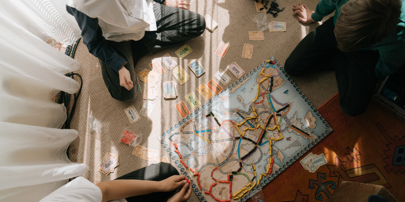 Boys playing a board game